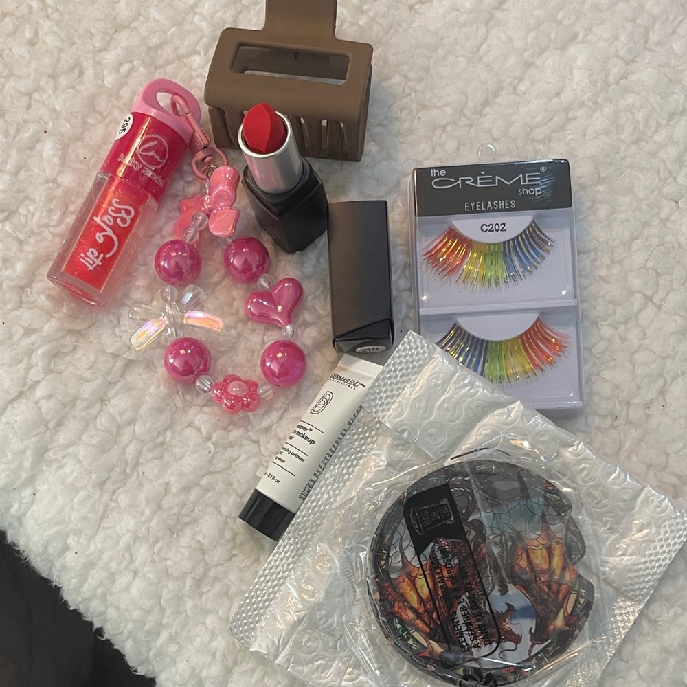 Red Lipstick with a bundle of products: stocking stuffers